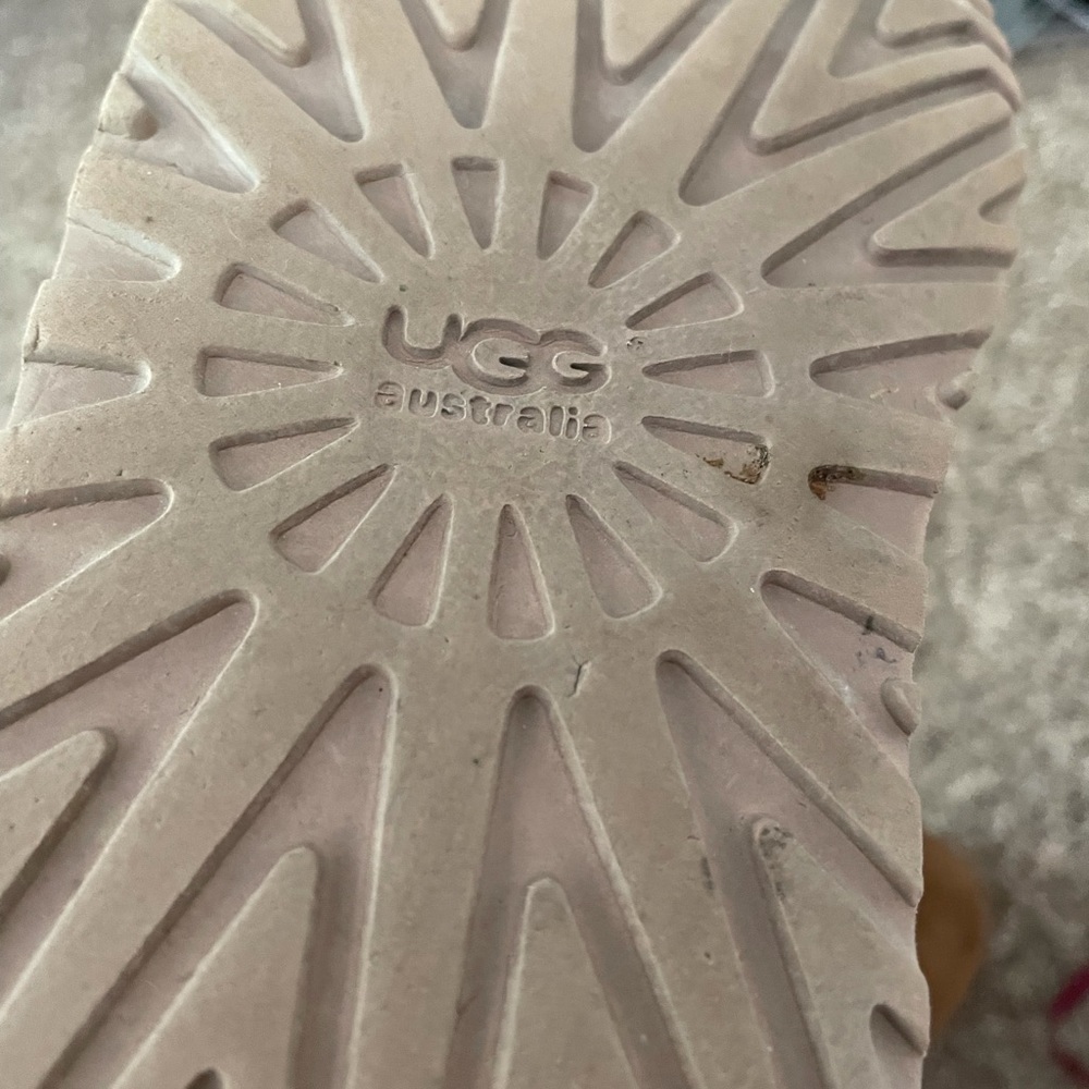 Chestnut color/brown UGGs bows up the back good shape big girls size two.